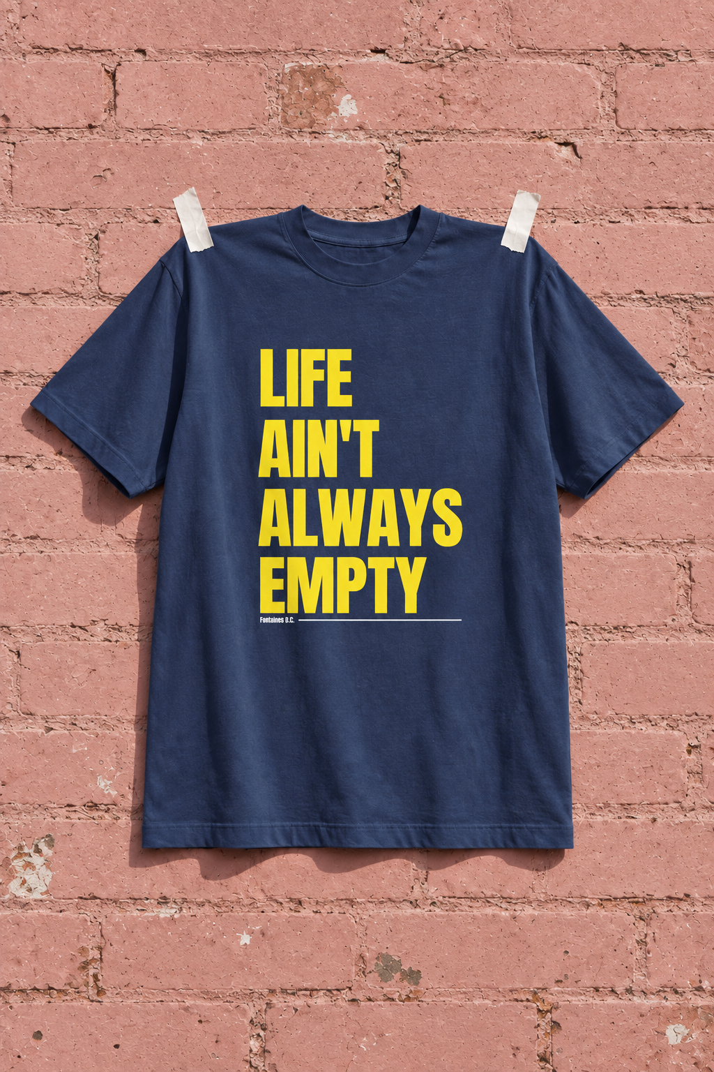 Fontaines DC A Hero's Death Navy Blue Heavy Weight Tee — Pink wall | NEVER ENOUGH gallery